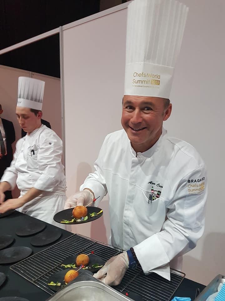 Chef Alan Coxon with his Divine Saffron–$100 donut, Chef Summit 2019, Monte Carlo.